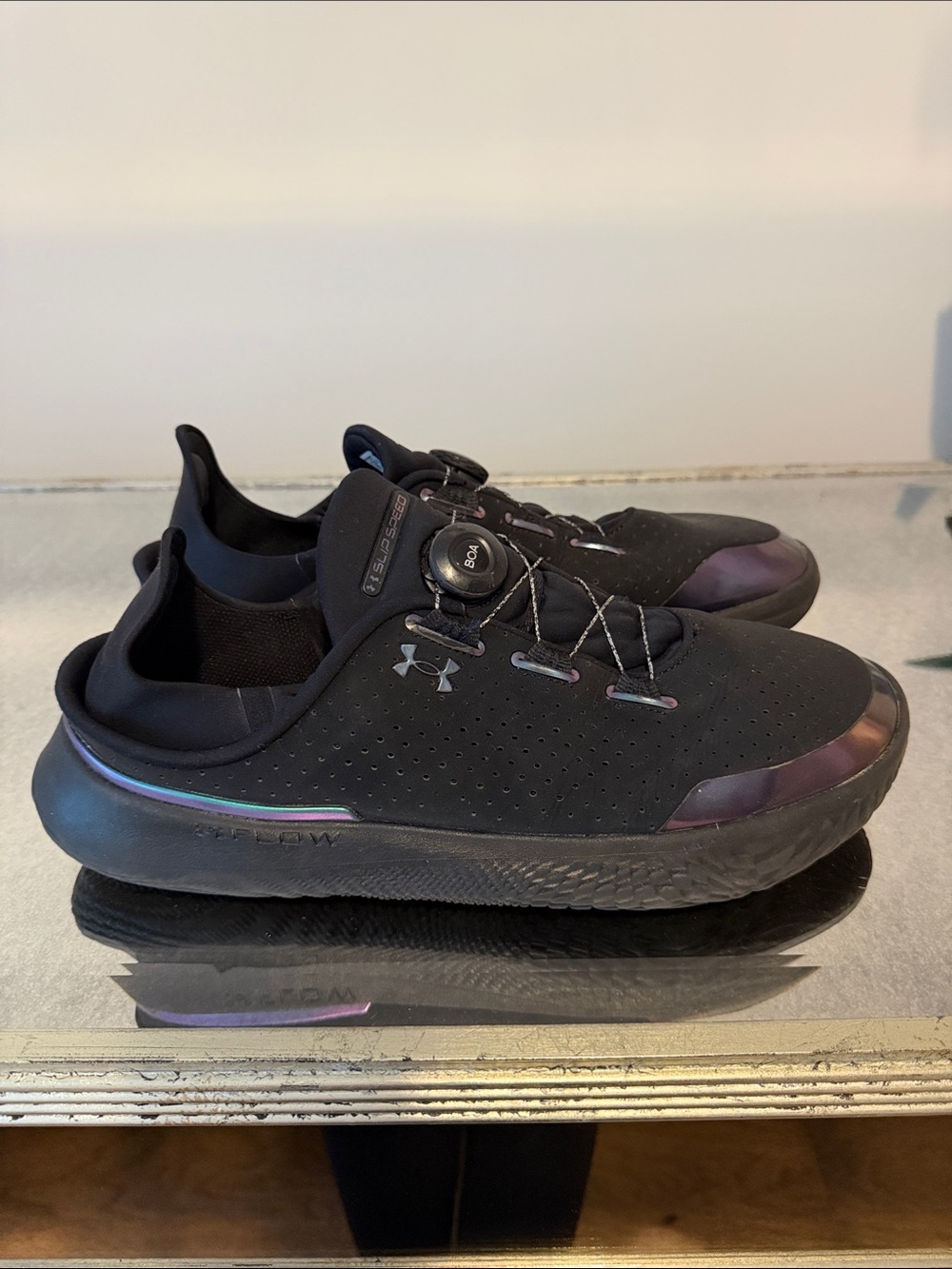 Under Armour Men’s Black Athletic Slip-On Sneakers with Iridescent Accents
